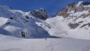 Crossing Lac Blanc with the Col du Belvedere behind