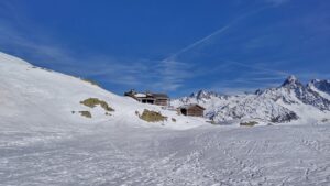 Lac Blanc refuge features on many hikes and ski tours