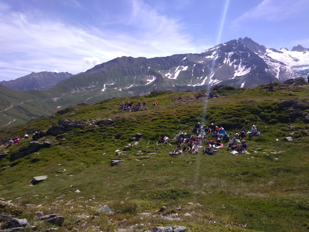 People picnicking on a mountain top