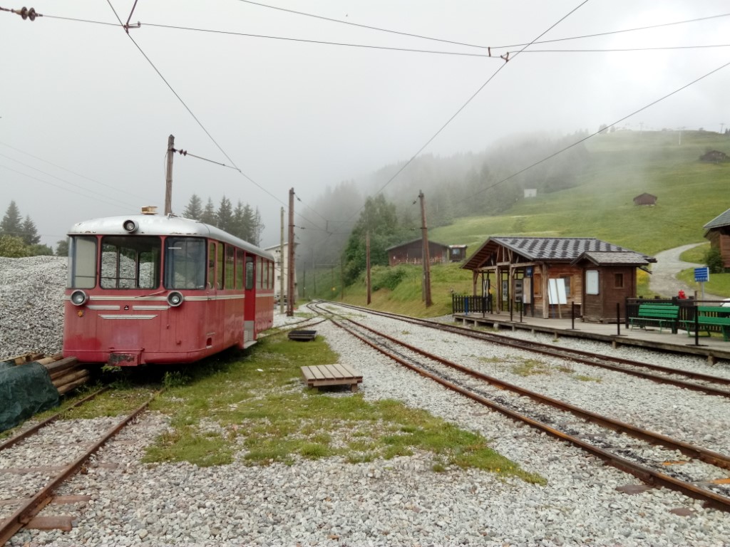 A railway line on a mountain in the fog