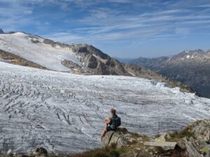 Hiker looking at a glacier