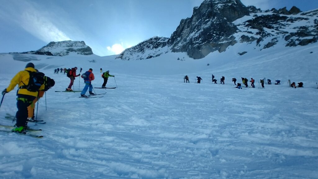 Lots of ski tourers getting ready at the bottom of the glacier