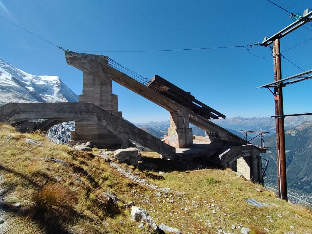 Abandoned cable car station - a concrete structure on a mountainside