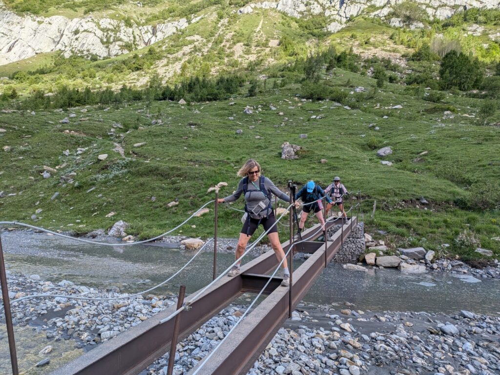 Hikers on an unfinished bridge