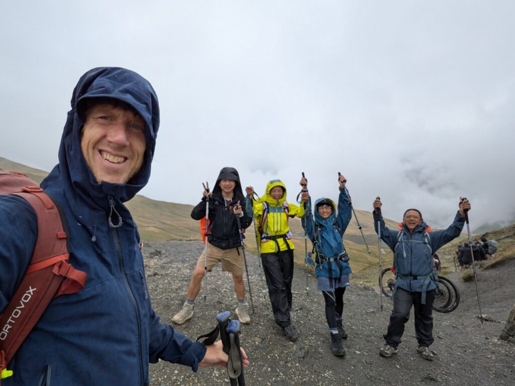 Hikers in wet weather - well prepared with waterproofs
